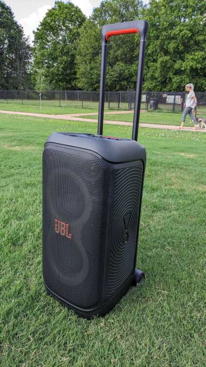 JBL PartyBox Stage 320 in grass.