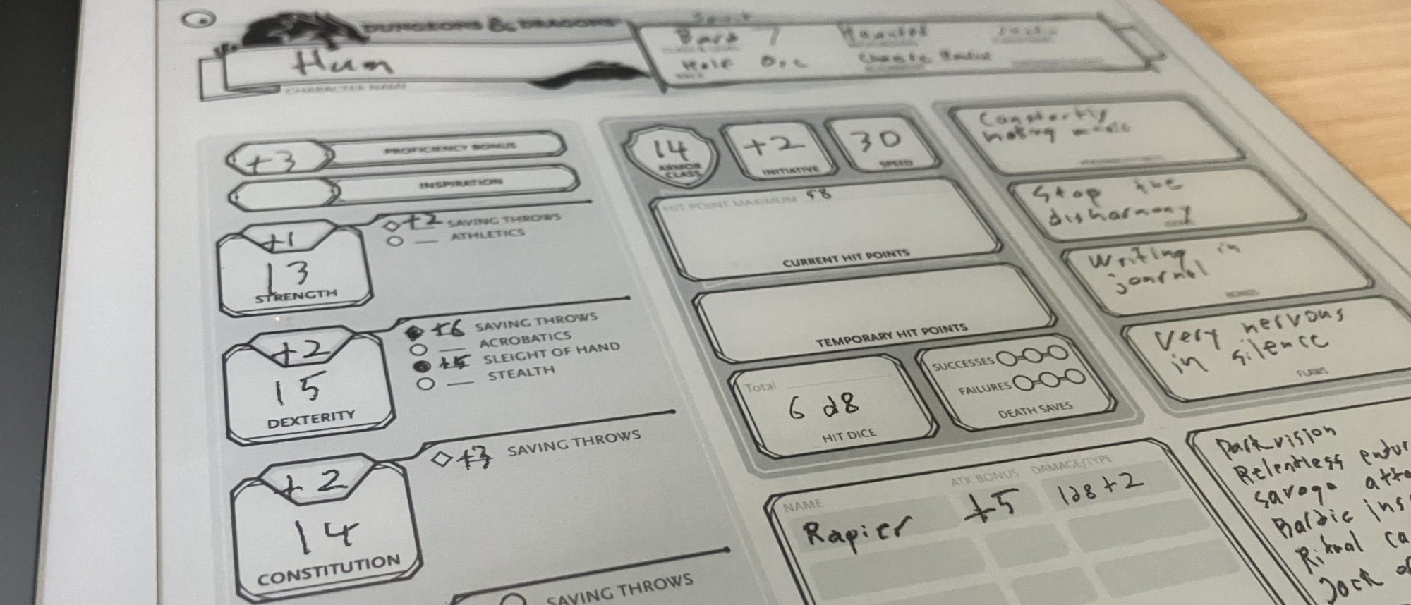 The character sheet for Hum, my half-orc bard